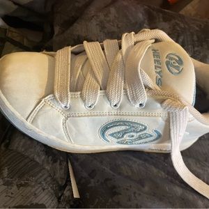 Heely’s  like new ! Leather with wheels and tool